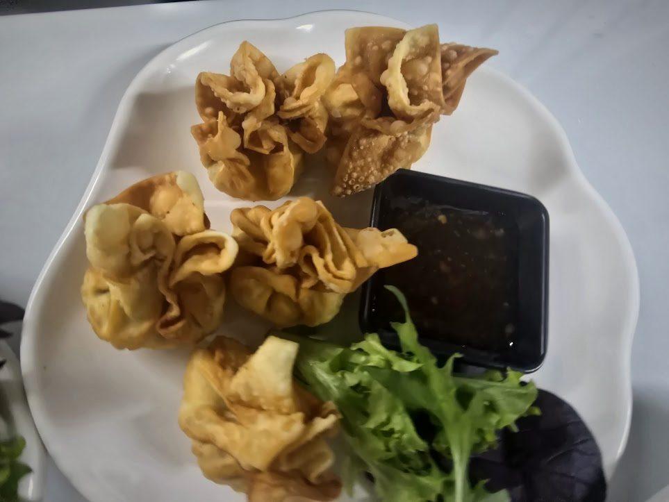 Crispy wonton money bags with dipping sauce