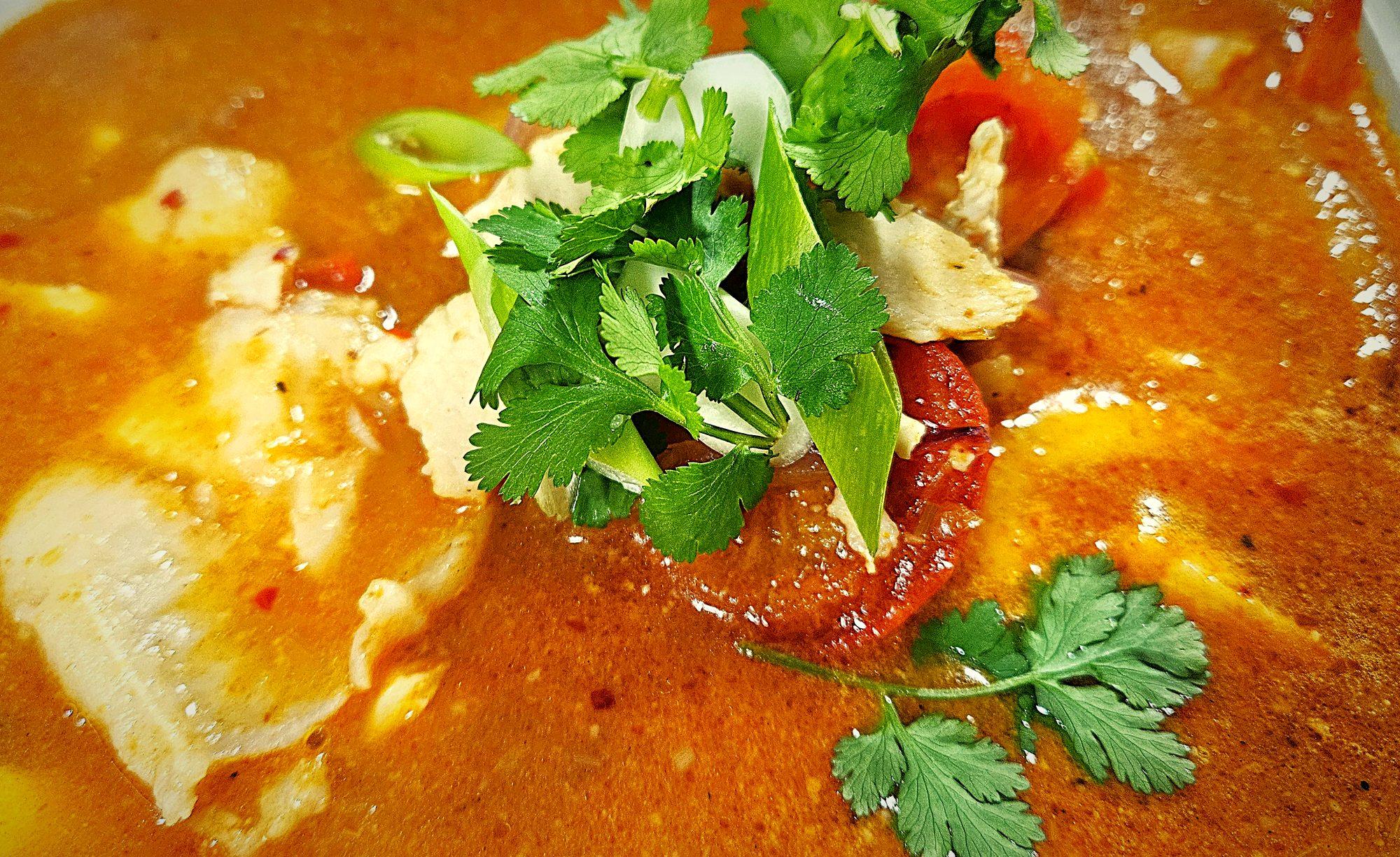 Tom yum soup with fresh coriander